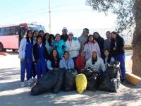 Realiza UPAM faena comunitaria de limpieza en acceso a la universidad